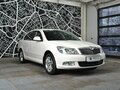 2011 Skoda Octavia II (A5) Рестайлинг, белый - вид 1