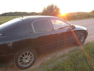 2002 Mitsubishi Carisma I Рестайлинг, чёрный, 170000 рублей, вид 4