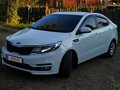 2015 Kia Rio III Рестайлинг, белый - вид 1