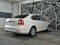 2011 Skoda Octavia II (A5) Рестайлинг, белый - вид 4