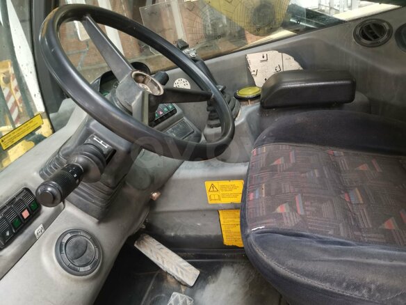 2007 New Holland L - series, жёлтый, 2547060 рублей - вид 4
