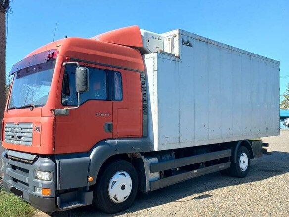 2003 MAN TGA, красный, 1700000 рублей - вид 1