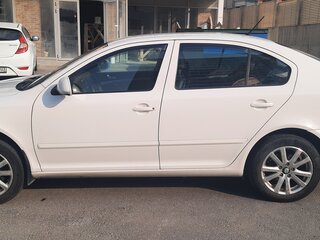 2012 Skoda Octavia II (A5) Рестайлинг, белый, 870000 рублей, вид 4