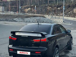 2011 Mitsubishi Lancer X Рестайлинг, чёрный, 900000 рублей, вид 4