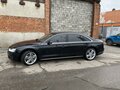 2015 Audi A8 Long III (D4) Рестайлинг, чёрный - вид 4