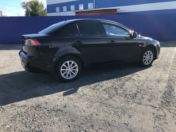 2014 Mitsubishi Lancer X Рестайлинг, чёрный, 980000 рублей - вид 5