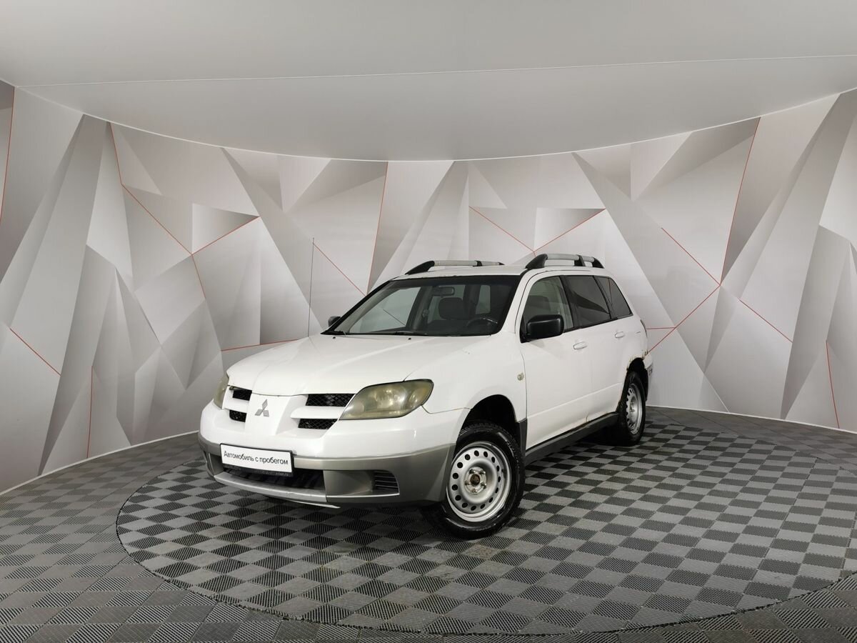 Открыть фотографии: Mitsubishi Outlander I