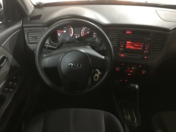 2010 Kia Rio II Рестайлинг, чёрный - вид 4