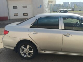 2010 Toyota Corolla X (E140, E150), серебристый, 920000 рублей, вид 3