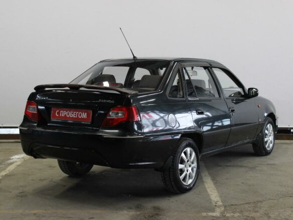 2010 Daewoo Nexia I Рестайлинг, чёрный - вид 5