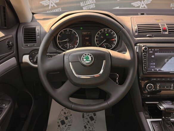 2012 Skoda Octavia II (A5) Рестайлинг, белый - вид 14