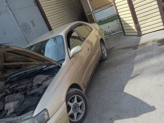 1993 Toyota Corona IX (T190), золотистый, 230000 рублей, вид 1