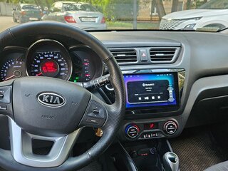 2012 Kia Rio 4-speed III, серебристый, 750000 рублей, вид 2