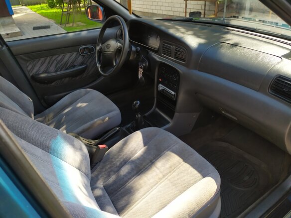 1999 Kia Clarus II, зелёный, 104437 рублей - вид 5