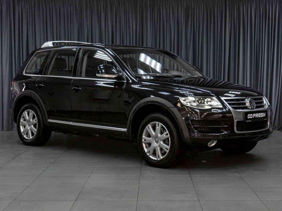 Открыть фотографии: Volkswagen Touareg I Рестайлинг