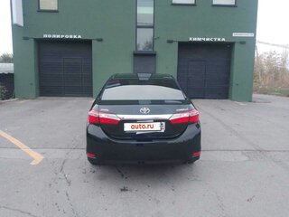 2013 Toyota Corolla XI (E160, E170, E180), чёрный, 1650000 рублей, вид 3