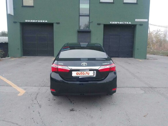 2013 Toyota Corolla XI (E160, E170, E180), чёрный, 1650000 рублей - вид 2