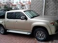 2009 Mazda BT-50 MZR-CD I Рестайлинг, бежевый - вид 1