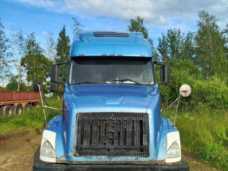 2003 Volvo VNL, голубой, 1300000 рублей, вид 1