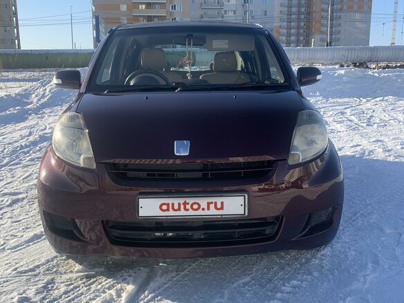 2009 Toyota Passo I (C10), коричневый, 520000 рублей