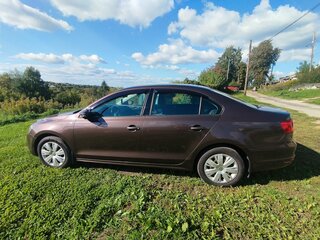 2014 Volkswagen Jetta VI, коричневый, 850000 рублей, вид 4