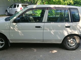 2001 Mazda Demio I (DW), белый, 495000 рублей, вид 4