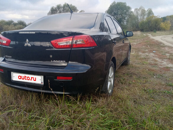 2008 Mitsubishi Lancer X, чёрный, 650000 рублей - вид 16