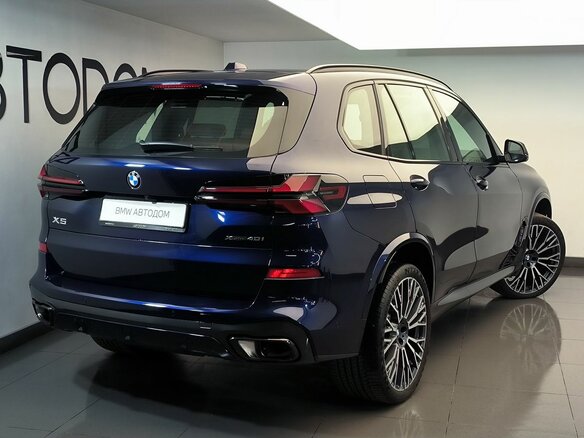 2025 BMW X5 40i IV (G05/G18) Рестайлинг, синий - вид 1