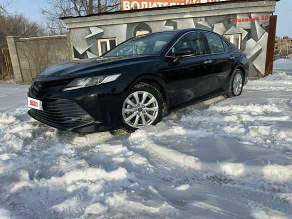 2019 Toyota Camry VIII (XV70), чёрный, 3150000 рублей - вид 1