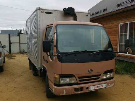 1996 Nissan Condor, коричневый, 927000 рублей, вид 1