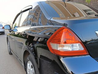 2011 Nissan Tiida I Рестайлинг, чёрный, 800000 рублей, вид 4