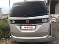 2010 Mazda Biante, серый, 920000 рублей - вид 1