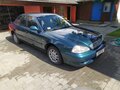 1999 Kia Clarus II, зелёный, 104437 рублей - вид 1