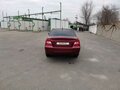 2009 Daewoo Nexia I Рестайлинг, красный - вид 3