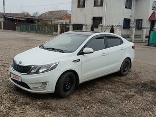 2012 Kia Rio 4-speed III, белый, 870000 рублей, вид 2