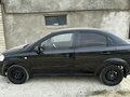 2011 Chevrolet Aveo I Рестайлинг, чёрный, 300000 рублей