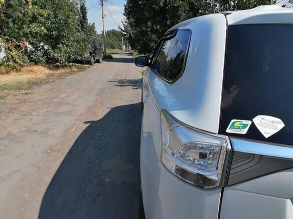2014 Mitsubishi Outlander PHEV III, белый, 1900000 рублей - вид 13