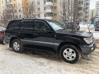 2004 Toyota Land Cruiser 100 Series Рестайлинг 1, чёрный, 2999000 рублей, вид 1