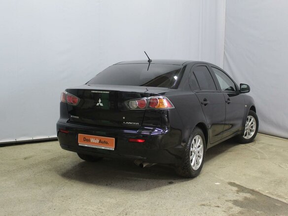 2014 Mitsubishi Lancer X Рестайлинг, чёрный - вид 1