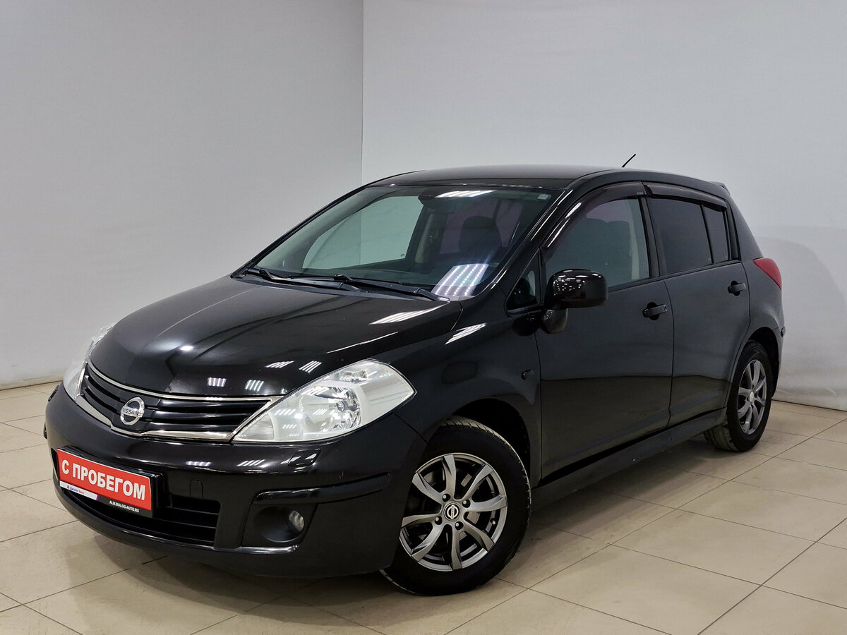 Открыть фотографии: Nissan Tiida I Рестайлинг