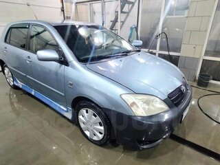 2004 Toyota Corolla IX (E120, E130), голубой, 430000 рублей, вид 4