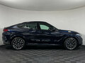 2025 BMW X6 40i III (G06) Рестайлинг, синий - вид 3