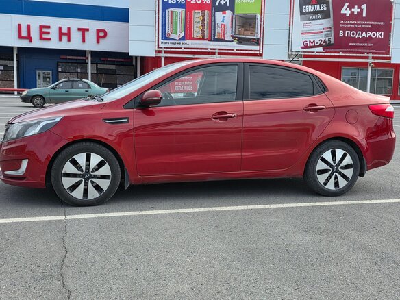 2011 Kia Rio 4-speed III, красный, 800000 рублей - вид 7