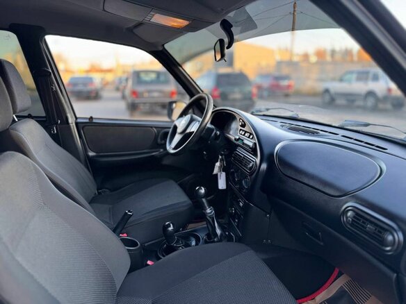 2011 Chevrolet Niva I Рестайлинг, серебристый, 421000 рублей - вид 9