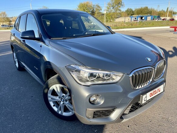 2017 BMW X1 20i xDrive II (F48), серый - вид 12