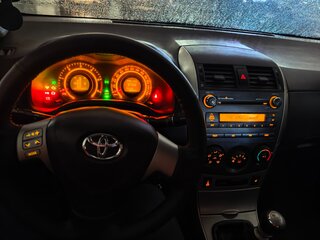 2009 Toyota Corolla X (E140, E150), серебристый, 535000 рублей, вид 1