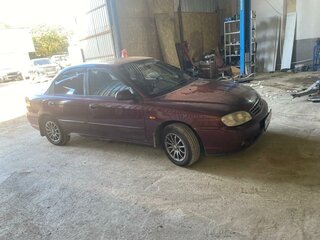2007 Kia Spectra I Рестайлинг 2, красный, 180000 рублей, вид 3