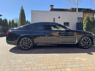 2020 BMW 7 серии 740d xDrive VI (G11/G12) Рестайлинг, чёрный, 4300000 рублей, вид 2