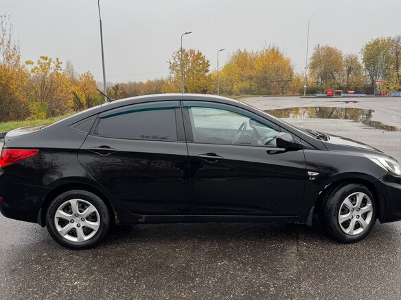 2011 Hyundai Solaris I, чёрный, 770000 рублей - вид 5