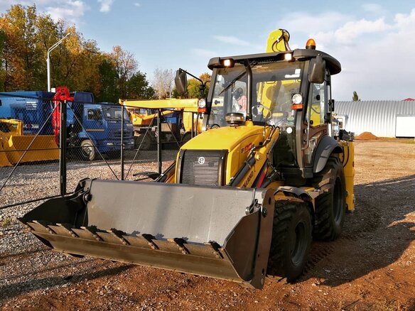 2023 New Holland B80B, жёлтый - вид 3